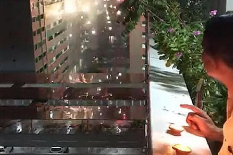 A 23-second video shows fireworks being launched from between two Housing Board blocks in Jurong West Street 73. PHOTO: SG ROAD VIGILANTE/FACEBOOK