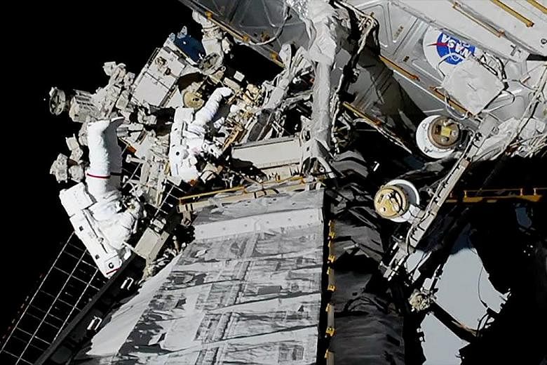 US astronauts Jessica Meir and Christina Koch on the first all-female spacewalk outside the International Space Station on Oct 18. The UN Committee on the Peaceful Uses of Outer Space, which Singapore is set to join, was set up in 1959 to govern the 