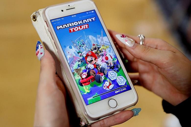 Racing app Mario Kart Tour is regarded as the Nintendo title most suitable for smartphones in terms of money-making opportunities and features to hook players. PHOTO: REUTERS