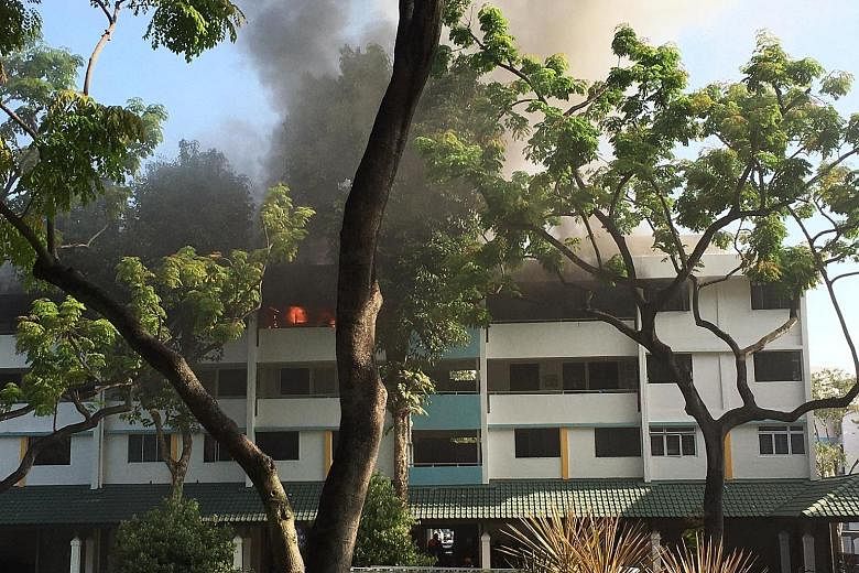 An elderly woman alone in her Ang Mo Kio Housing Board flat had to run to her neighbour for help when a fire broke out in her kitchen yesterday. About 40 residents in the block had to be evacuated as a result of the fire which involved some items in 