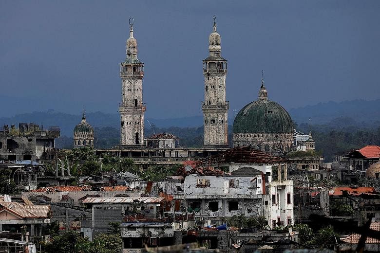 Dilapidated structures at the most affected war-torn area of Marawi City in the Philippines, as seen in May. Extremists seeking to establish an ISIS stronghold laid siege to the city in 2017 and occupied it through five months of air and ground assau