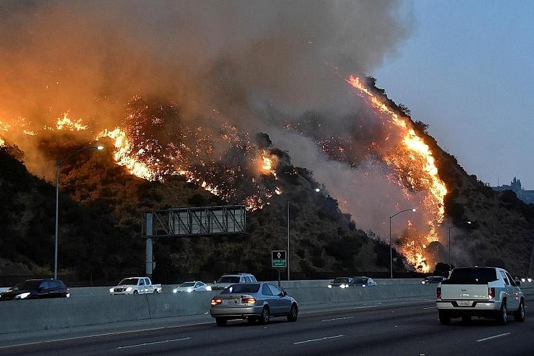 The latest fire broke out near the Getty Centre museum, covering more than 240ha in the scrub-covered hills around Interstate 405.