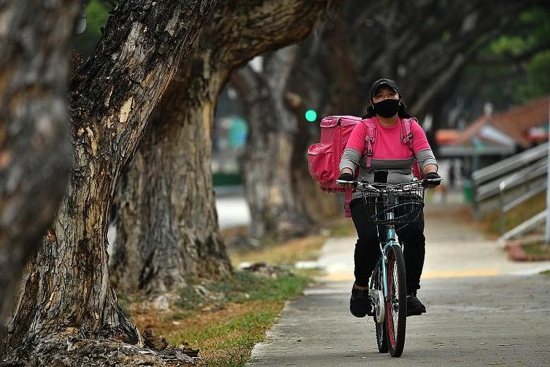 The food delivery sector in South-east Asia could grow to US$20 billion by 2025, almost four times its current US$5.2 billion, according to a report released this month by Google, Temasek Holdings and Bain & Company. ST PHOTO: LIM YAOHUI