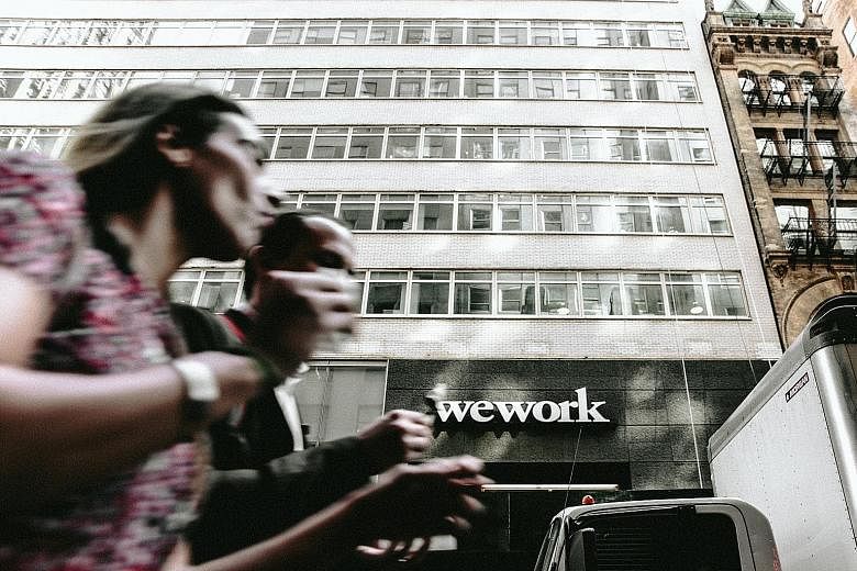 A WeWork location near New York City’s Times Square. WeWork was recently reported to be considering a rescue valuation of US$8 billion (S$10.9 billion) following a failed initial public offering, a whopping US$39 billion discount to its last valuation in 