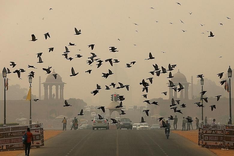 Smog covering the area near India's Presidential Palace in New Delhi on Friday, a day recorded as the most polluted in around two years. Besides vehicular and factory emissions, the toxic smog that hangs over Delhi, as well as its suburbs, is a mix o