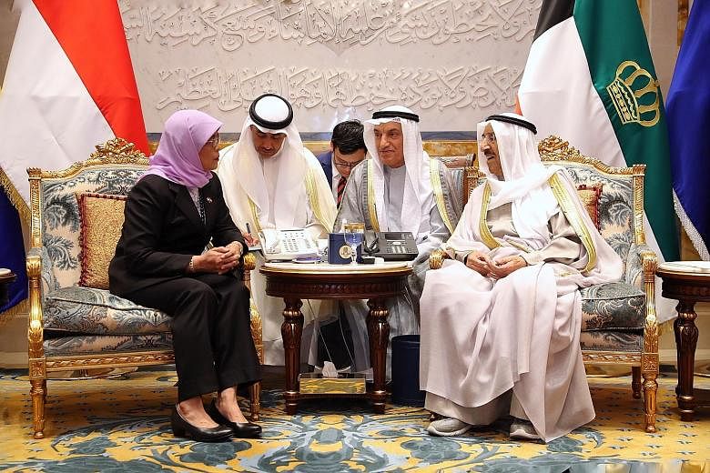 President Halimah Yacob meeting Kuwait Emir Sheikh Sabah Al Ahmad Al Jaber Al Sabah (right) at the country's Bayan Palace yesterday. The two leaders reaffirmed the warm and longstanding friendship between their countries. PHOTO: MCI