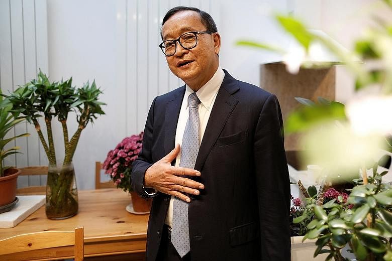 Mr Sam Rainsy, co-founder of the Cambodia National Rescue Party and a former finance minister, was prevented from boarding a Thai Airways flight from Paris to Bangkok yesterday. PHOTO: REUTERS Ms Mu Sochua, vice-president of the now-dissolved Cambodi