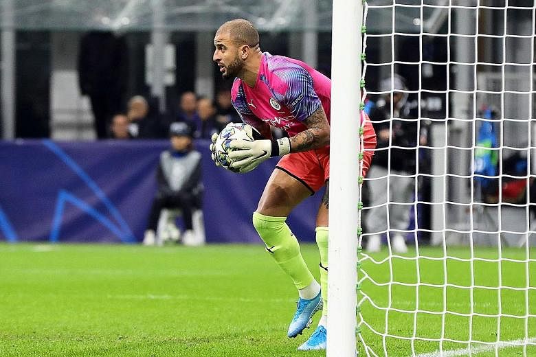 Manchester City's defender Kyle Walker taking over goalkeeping duties after Claudio Bravo was sent off for fouling Atalanta's Josip Ilicic in the 81st minute of their Champions League Group C match on Wednesday. The match ended 1-1. PHOTO: EPA-EFE