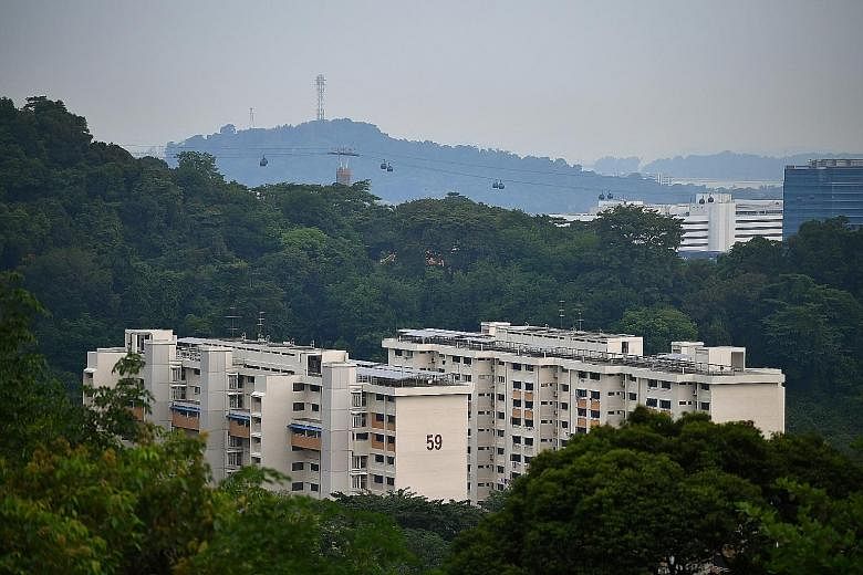 Last month, 2,213 HDB resale flats changed hands, an 18 per cent increase from September, according to real estate portal SRX Property. ST PHOTO: LIM YAOHUI