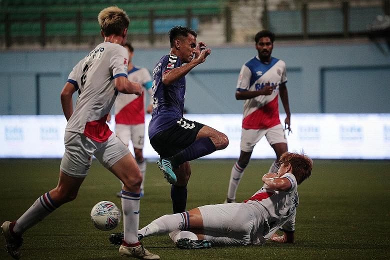 Warriors FC (in white) were losing finalists to Tampines Rovers in the Singapore Cup last Saturday. The club have been charged with offences against the Employment Act for owing over $350,000 in salaries. 