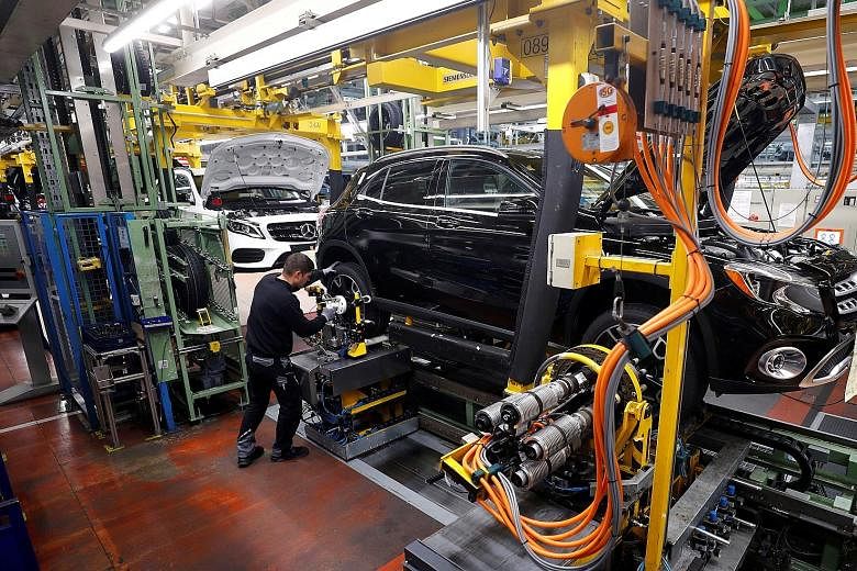 Mercedes-Benz vehicles at a factory in Rastatt, Germany. A 25 per cent US levy on foreign cars would have added €110,000 (S$165,160) to the sticker price of EU vehicles imported into the United States, according to the Brussels-based European Commi