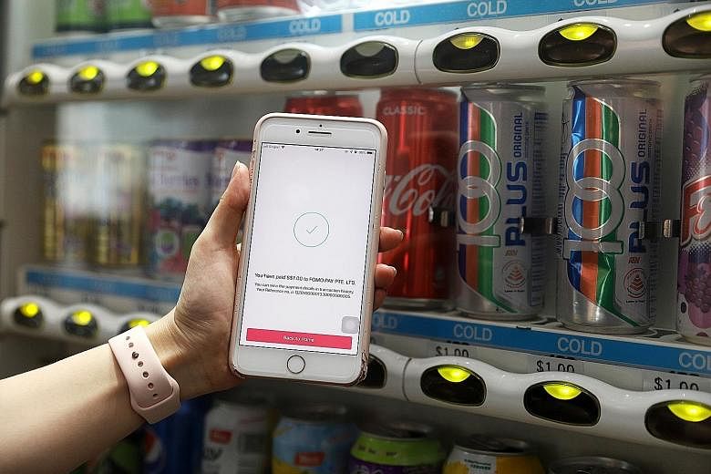 Singapore's first SGQR-enabled vending machine, a collaboration between payment solutions provider FOMO Pay and fintech firm D'Cube Concepts. The inclusion of fintech players in the banking sector can lead to novel ways of doing banking and a seamles