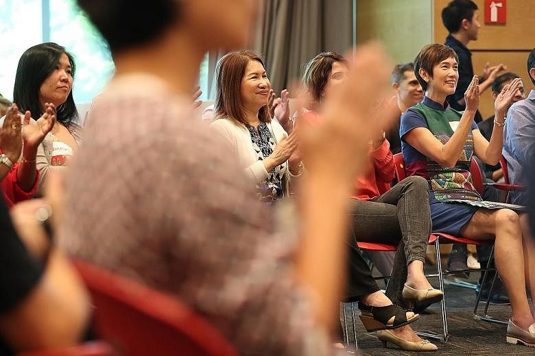 Manpower Minister Josephine Teo (at right) attending the Citizens' Panel on Work-Life Harmony's fourth and final session at the Lifelong Learning Institute yesterday.