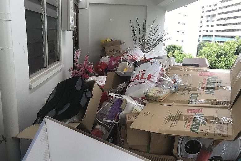 The Aljunied-Hougang Town Council issued a warning last Tuesday to a 67-year-old woman to clear the rubbish in her flat within a week, or risk having town council staff move her possessions for her. The woman's executive maisonette in Block 522 Houga