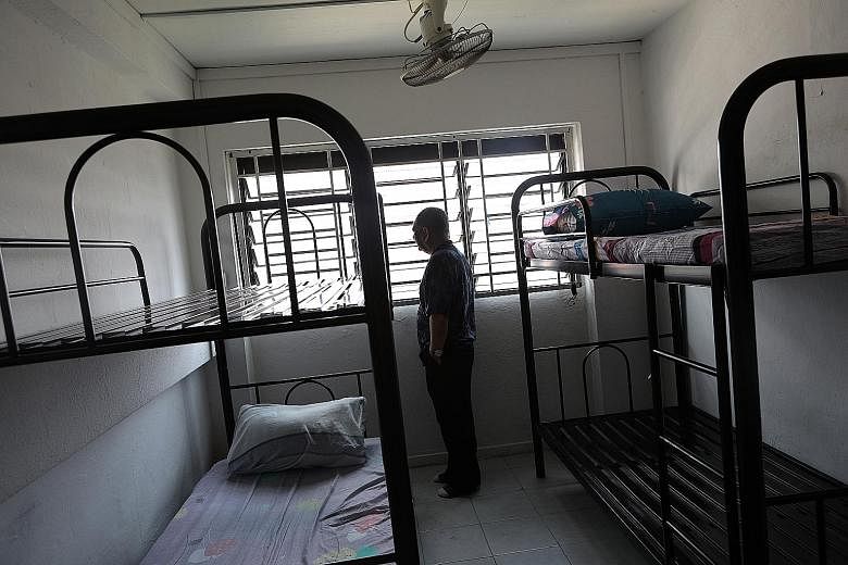 The New Hope Community Services runs a transitional shelter for the homeless at its Jalan Kukoh premises. It offers them a longer-term stay of up to six months, while its social workers help to find them a job and long-term housing options. ST PHOTOS