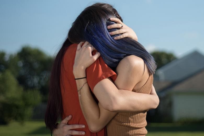 Sisters F and E (identities withheld) are survivors of child sexual abuse in the US whose photos and videos of their anguish have been preserved on online platforms. PHOTO: NYTIMES