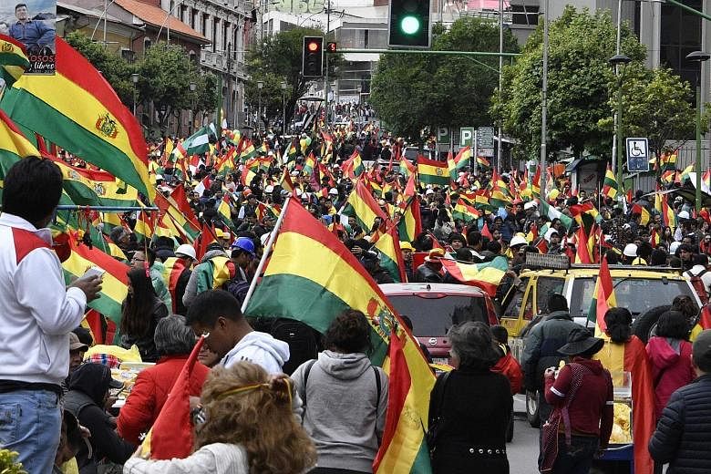 Mr Evo Morales said on Sunday he would step down to ease the violence that has gripped Bolivia since a disputed vote. Crowds taking to the streets of Bolivia's capital La Paz on Sunday to celebrate the resignation of President Evo Morales. But as nig