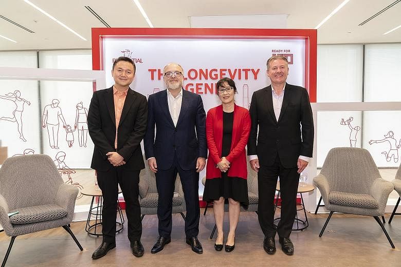 Panellists at yesterday's discussion: (from left) Mr Jeffrey Tan, National Volunteer and Philanthropy Centre's director for knowledge, marketing and advocacy; Professor Andrew Scott from the London Business School; Dr Carol Tan, medical director of T