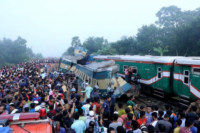 Three coaches were sent crashing off the tracks at Mondobhag station in the Bangladeshi town of Kasba when a Dhaka-bound train and a locomotive bound for Chittagong collided early yesterday morning. The collision killed at least 16 people and injured