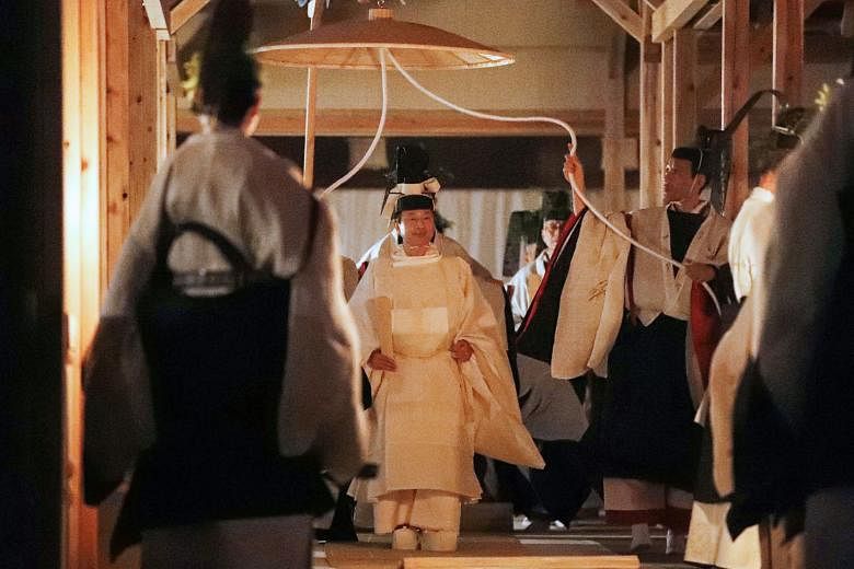 Japanese emperor begins last major accession rite: spending the