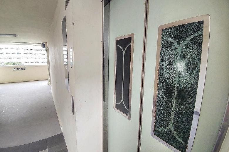 In August last year, a man was arrested after allegedly smashing the glass panels of lift doors in Eunos Crescent (right). The 15 PAP town councils said on Wednesday that the number of lift vandalism cases fell from 342 in 2017 to 90 over the past 12