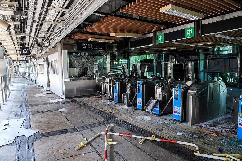 Vandalised turnstiles at the University MTR station in Sha Tin, close to The Chinese University of Hong Kong, yesterday.