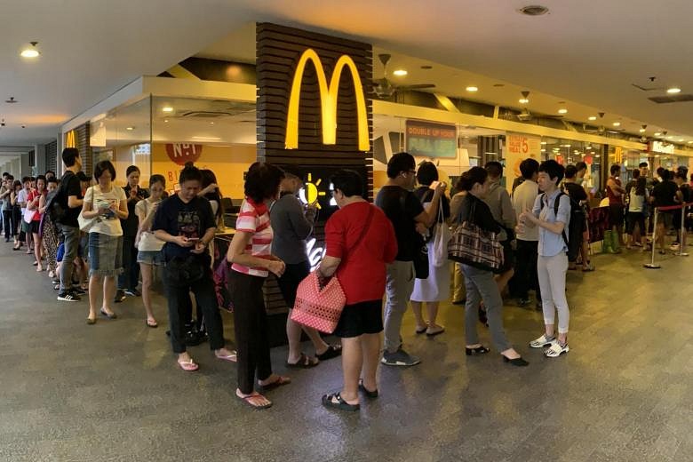 Fans queue from midnight for limited edition Hello Kitty carrier