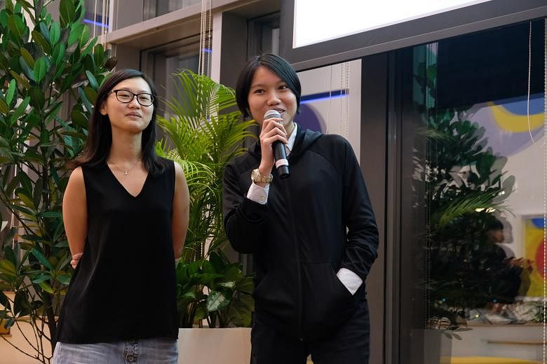Ms Goh Pei Wing (left) and Ms Jamie Soo won the first prize in the XDS Data Storytelling competition that took place on Nov 14, 2019.
