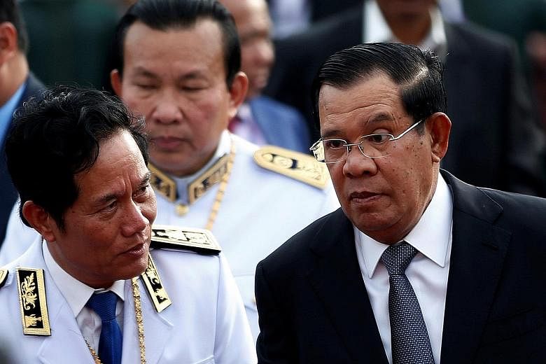 Cambodia's Prime Minister Hun Sen (right) attending a water festival in Phnom Penh. Asia's longest-serving leader has had to deal with discontent building among the country's 16 million people over a number of issues.