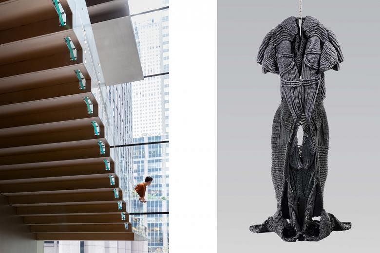 Indian sculptor Mrinalini Mukherjee’s artwork Yakshi (1984, right) is on display at the Museum of Modern Art (left).