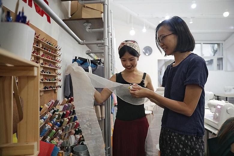 Olivia Ho learning fashion upcycling from textile artist Agatha Lee.