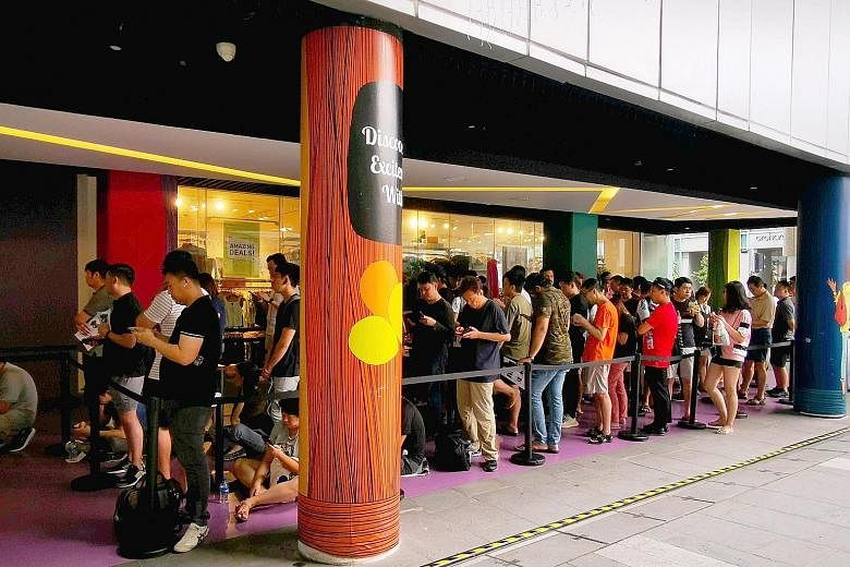 200 fans who queued up for the launch of its Mate 30 smartphones at 313@Somerset.