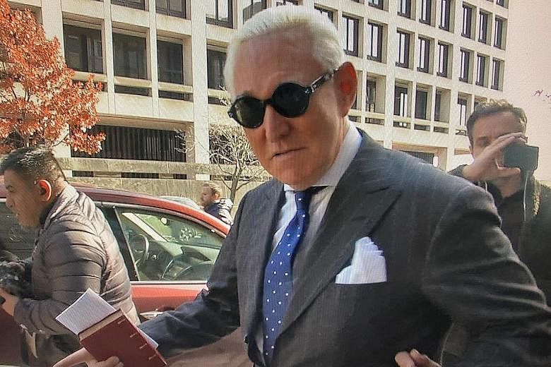 A screengrab from a video showing Roger Stone outside the US District Court in Washington on Friday after he was found guilty of lying to the US Congress, obstructing justice and witness tampering. 