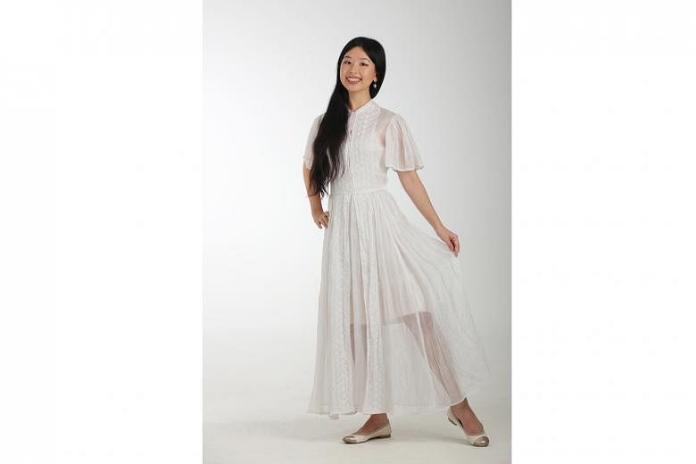 The Sunday Times writer Olivia Ho in her white silk organza gown, which she bought for $42.50 in a sale from United States-based Etsy store Simplicity Is Bliss. 