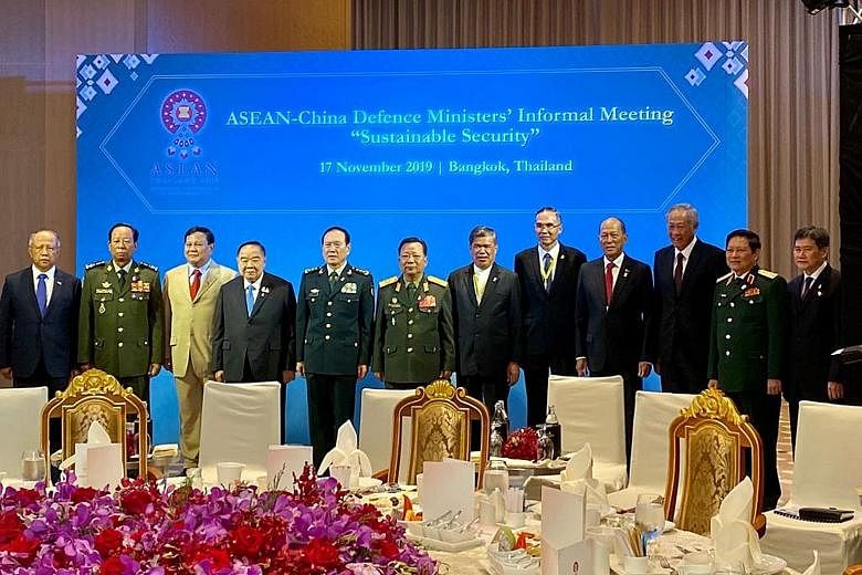 Singapore Defence Minister Ng Eng Hen (third from right) and his Asean defence counterparts at the meeting with Chinese Minister of National Defence Wei Fenghe (fifth from left) in Bangkok yesterday. 