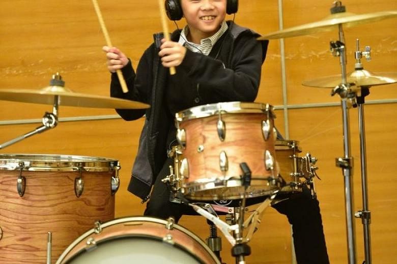 Lawrence Lim, nine, plays the drums for Charlie Puth’s hit Attention.