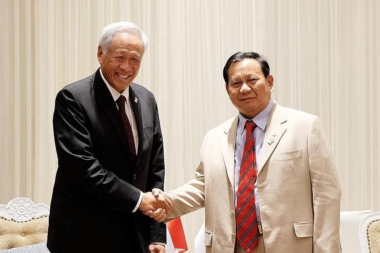 Defence Minister Ng Eng Hen meeting his Indonesian counterpart Prabowo Subianto on Sunday at the ADMM Retreat.