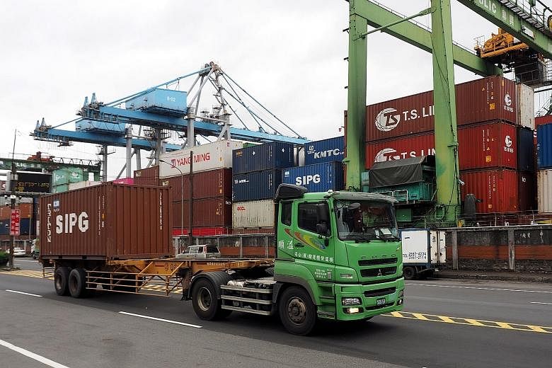 Containers at Keelung Harbour in Taiwan. Shipments to nine of Singapore's top 10 Nodx markets fell last month, with the exception of Taiwan. PHOTO: EPA-EFE