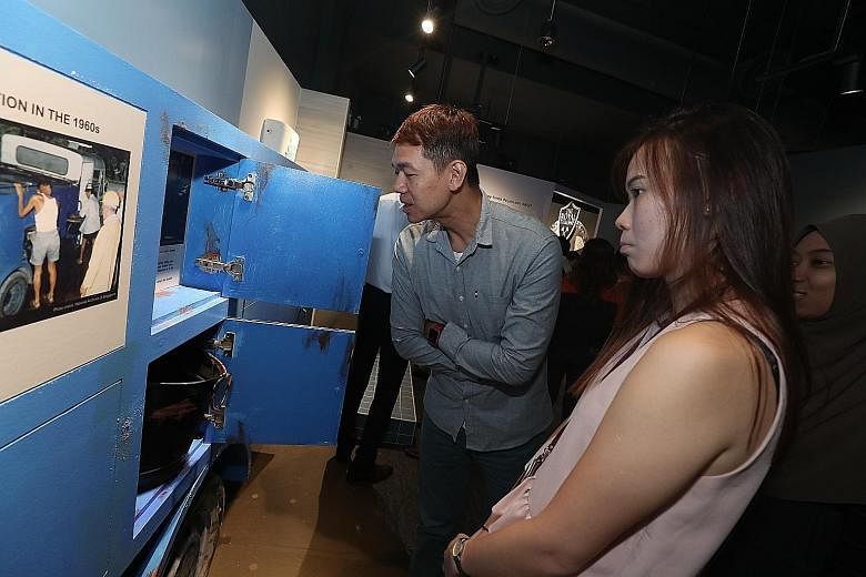 Visitors at the exhibition, which comprises five themed zones and features 15 interactive exhibits on different parts of the sanitation waste cycle.