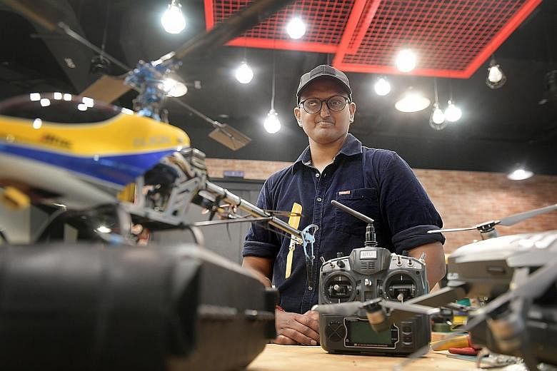 Mr B. Kanesh at Pixel, an innovation space at one-north for infocomm and media companies. Mr Kanesh, who belonged to the first batch of students to do the Diploma in Aeronautical and Aerospace Technology at Nanyang Polytechnic in 2009, set up a stude