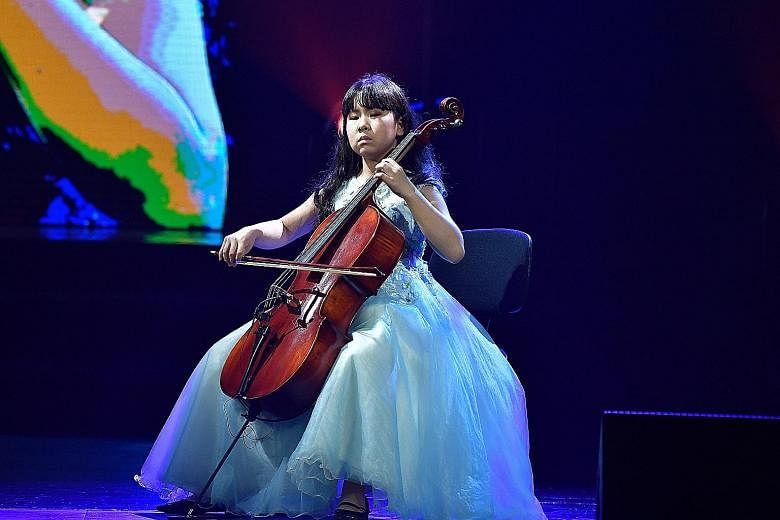 Michelle Zhu, 11, performing the Cello Suite No.1 by German composer Johann Sebastian Bach yesterday in front of an audience of more than 1,600.