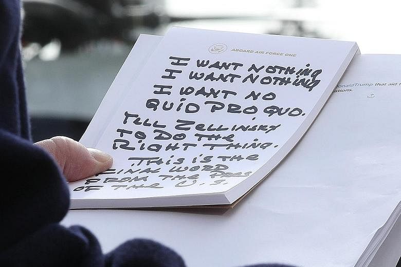 The notes which President Trump read off while speaking to the media before departing from the White House on Wednesday. Mr David Holmes, a political counsellor to the US Embassy in Ukraine's capital, and US President Donald Trump's former Russia adv