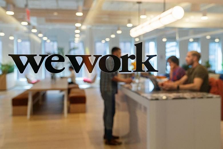 A WeWork office in New York City. WeWork told shareholders earlier this month that it lost almost US$1.3 billion (S$1.8 billion) in the third quarter, more than twice the losses recorded in the same period a year earlier. The lay-offs, which began "w
