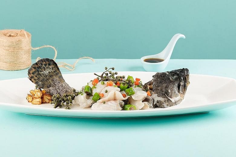 Steamed Fish In Spicy Sauce.