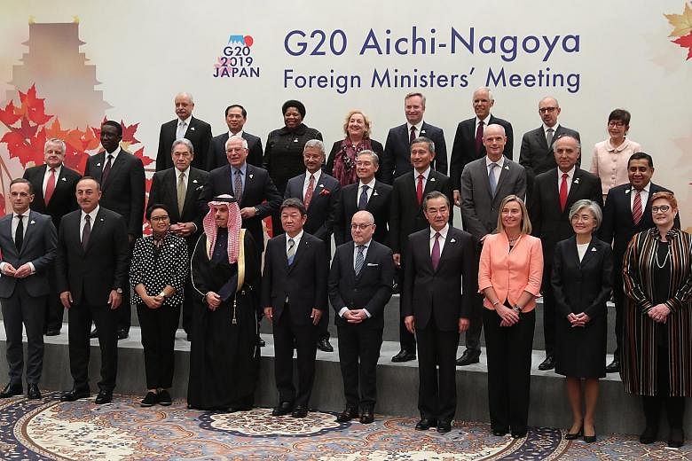 Singapore Foreign Minister Vivian Balakrishnan (middle row, fourth from right) with his counterparts and representatives at the G-20 Foreign Ministers' Meeting in Nagoya yesterday. Among the foreign ministers were South Korea's Ms Kang Kyung-wha (fro
