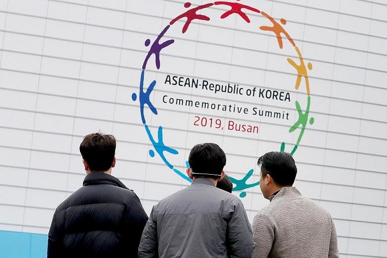 South Korean officials inspecting the venue for the Asean-Republic of Korea Commemorative Summit in the city of Busan yesterday. The two-day event marks 30 years of relations between Asean and South Korea. 