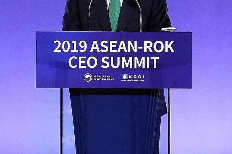 South Korean President Moon Jae-in yesterday reaffirmed a commitment to develop infrastructure in South-east Asia, leveraging on South Korea's strengths in transportation, energy and smart cities. PHOTO: EPA-EFE