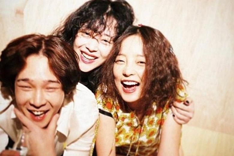 Singer-songwriter Nam Tae-hyun (above, left) posted a photo on Instagram of himself with Sulli (centre) and Goo Hara (right), which was later deleted.