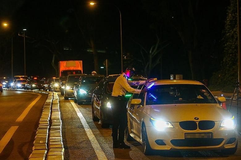 The number of offenders caught for drink driving fell from 1,568 in the January to September period last year to 1,486 this year. PHOTO: LIANHE ZAOBAO FILE