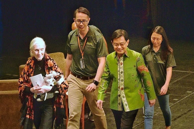 (From left) Renowned primatologist Jane Goodall with Mr Tay Kae Fong, former president of Jane Goodall Institute (Singapore), Deputy Prime Minister Heng Swee Keat and the institute's president Andie Ang at the NUS University Cultural Centre yesterday